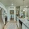 a kitchen with a marble counter