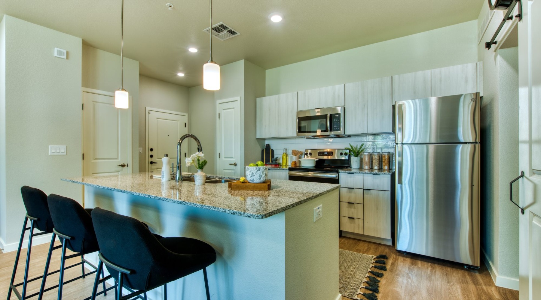 kitchen with bar stools and an island