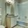 a bathroom with a tub toilet and sink