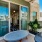 a patio with a table and chairs
