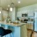 a kitchen with a marble island